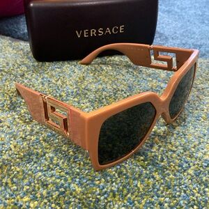 Tan Women’s Versace Sunglasses.